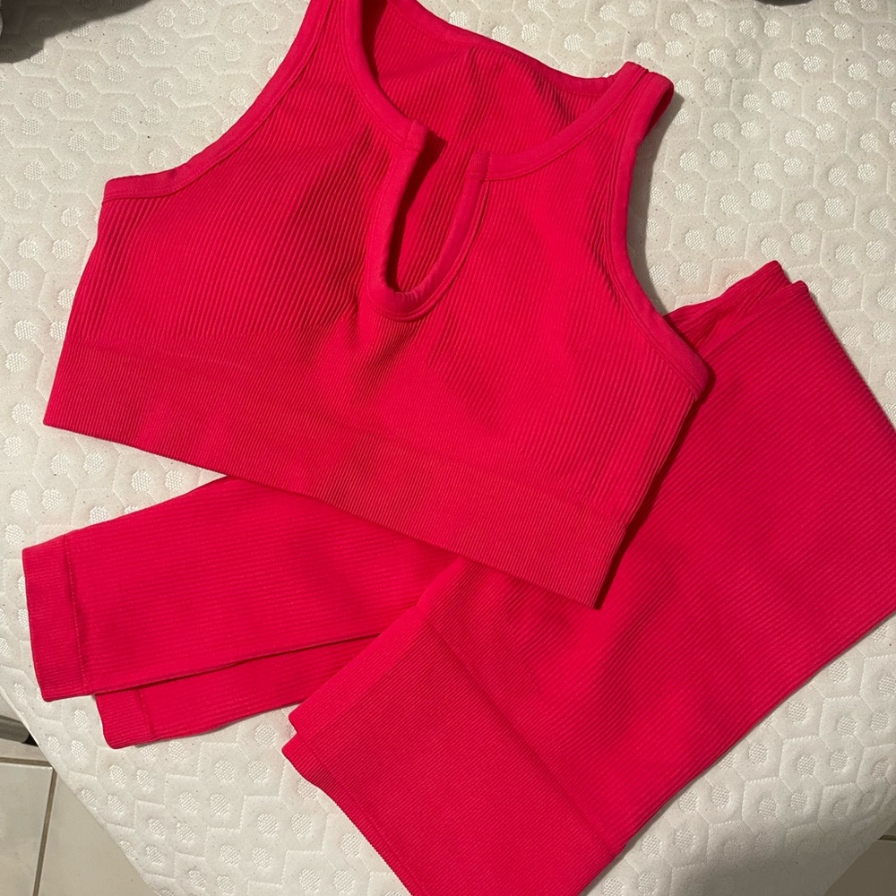 Hot pink ribbed workout set.